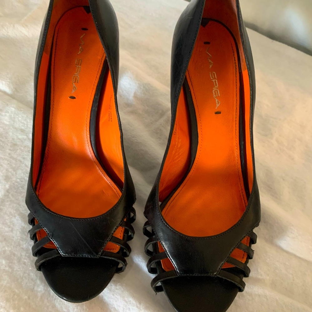 Black pumps with open toe detail